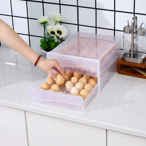 Two Tier Stackable Egg Organizer for Fridge Clear Plastic Egg Storage Bin Holds Up to 60 Eggs Drawer Design open on counter