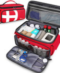 Mancro red first aid bag with multiple pockets, opened to reveal medical supplies, bottles, bandages, and scissors.