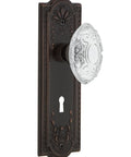 Meadows Passage Door Knob Set In Timeless Bronze, 2.75 Inch, featuring lead-free crystal knob with forged brass backplate