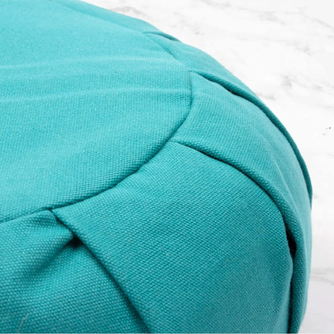 Zafu Yoga Meditation Cushion With Washable Cover And Buckwheat Filling Soft Round Cotton Floor Pillow For Meditation Pranayama And Stress Relief Turquoise Color Cozy Ergonomic Vibe For Home Studio Or Yoga Room close-up of stitched cotton cover