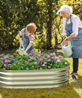Galvanized Raised Garden Bed For Outdoor Use 4 By 2 By 1 Foot Oval Design Built Tough With Hassle Free Assembly in backyard