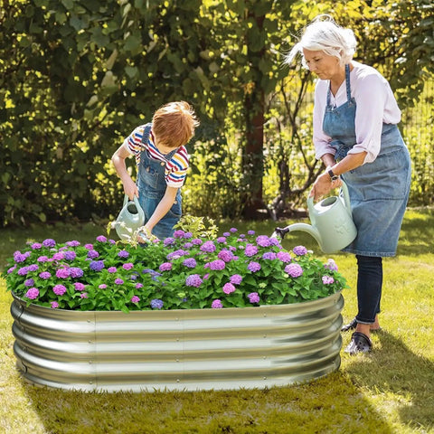 Galvanized Raised Garden Bed For Outdoor Use 4 By 2 By 1 Foot Oval Design Built Tough With Hassle Free Assembly in backyard