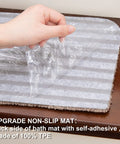 Peeling back adhesive layer on No Slip Stair Treads for Kids and Pets 28x9 Inch Indoor Carpet Runners With 100 Percent Polyester and TPE Backing