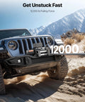 Beefed Up 12000 Lb Electric Winch With 85 Ft Steel Cable 12V Power Winch For Jeep Wrangler UTV ATV And Truck Off Road Recovery Wireless Remote Control And Heavy Duty Motor mounted on Jeep front bumper