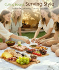 Top Shelf Deep Carbonized Bamboo Cutting Board With Sturdy Wood Storage Stand, serving charcuterie at a picnic