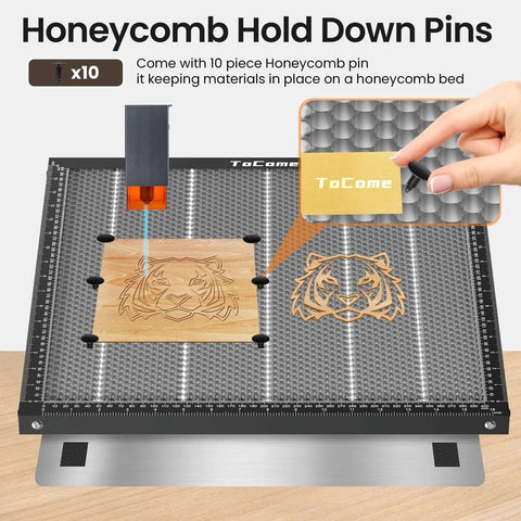 Front view of ToCome 500x500x22 mm steel honeycomb laser bed with a tiger-engraved wooden sample.