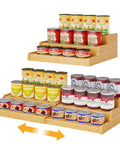 Expandable Bamboo Can Rack Organizer For Pantry With Three Tier Telescopic Design Holds Twenty Four Soda Cans, showcasing 3 tier design with cans.