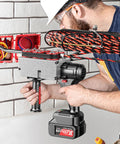 BDJSN Cordless Wire Stringing Machine in use, showing its battery pack and wiring setup by an electrician on a wall.