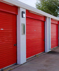 Go To Outdoor Sconce Wall Pack Light 2 Pack Built In LED 12W To 100W Wet Location on red storage unit exterior
