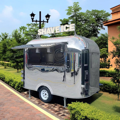 Premium Polished Mirror Food Trailer With Fold Down Awning And Stainless Steel Counter Space For Concession Operators And Mobile Coffee Shops Solid Gear To Crush Sales Daily, featuring an open window and SHAVE ICE sign.