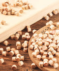 200 Piece Flat Head Wooden Screw Hole Plugs Three Eighths Inch Diameter One Quarter Inch Deep For Furniture Repair on wood surface