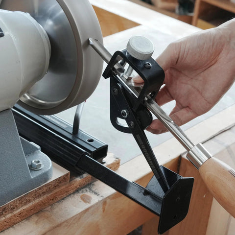 BG-GRIND4 grinding jig system on bench grinder; black steel, adjustable guide for chisels and gouges.