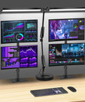 Two In One LED Desk Lamp With Dual Heads And Clamp Or Base Mount illuminating a multi-monitor setup on a desk