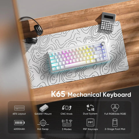 Next Level Tri Mode Wireless Mechanical Keyboard With Buttery Smooth Cnc Volume Knob Hot Swap Ready Pre Lubed Linear Switches Cozy Gasket Mount Rgb Gamer Board For Desktop Workstation Setups on wooden desk with calculator and headphones.