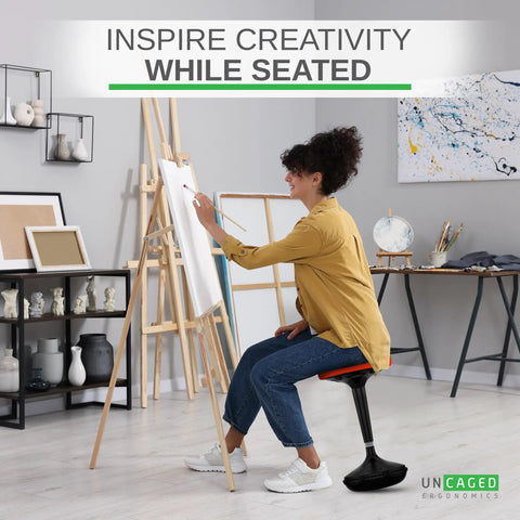 Person using Adjustable Standing Desk Stool For Home Office And Classroom Use Ergonomic Active Sitting Chair to paint