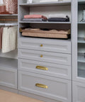 Top Shelf Modern Cabinet Pulls With 5 Inch Hole Centers And Brushed Gold Zinc Alloy Handles For Kitchen Drawers And Furniture Doors Six Pack, stylishly installed on gray storage drawers.