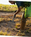 Person using Heavy Duty Steel Four Prong Pitch Fork For Digging And Loosening Soil Manure Rake With Easy Attach To Handle Not Included