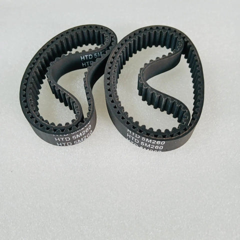 HTD 5M Timing Belts 260mm 15mm Wide For Electric Skateboard Four Pack Replacement Belts shown in curved form on gray surface