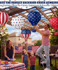 Five Pack 12 Inch Patriotic Hot Air Balloon Paper Lanterns For 4th Of July Indoor Outdoor Party Decor With Stars And Stripes Navy Star Field And Old Glory Designs hanging in backyard