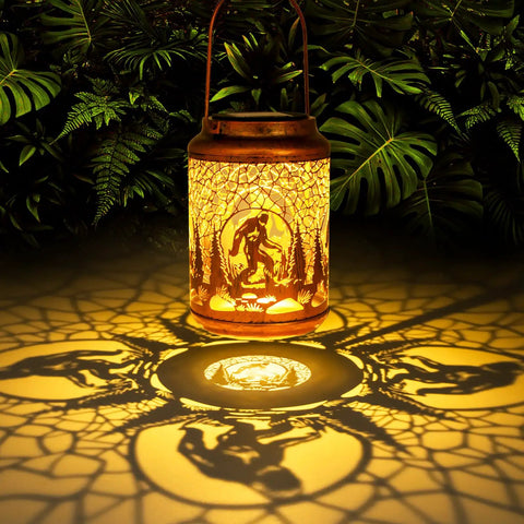Boho Mosaic Solar Lanterns Outdoor Lights Blue waterproof lantern casting intricate shadows in garden setting