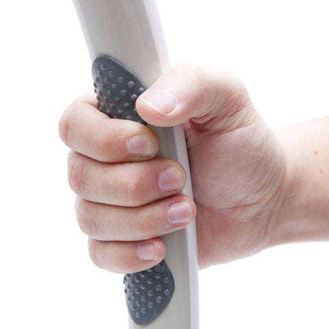 Close-up of hand gripping Suction Grip Bathtub And Shower Safety Handle White 24 Inch Non Slip Grab Bar No Tools Install Portable Easy Attach
