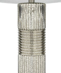 Close-up of Reeded Glass Table Lamp With Metal Base In Antiqued French Silver Mercury Glass Finish, White Linen Drum Shade