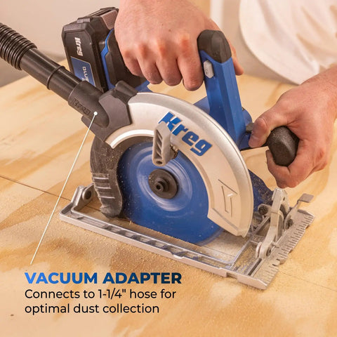 20V Ionic Drive 7.25 Inch Circular Saw Bare Tool With Powerful Brushless Motor Built-In Safety Features LED Cutline Light Integrated Dust Port Ideal For 2x4s Plywood And DIY Woodworking Projects Battery Or Charger Not Included being used on wood with vacuum adapter.