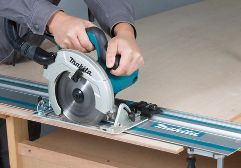 Person using 55 Inch Guide Rail for Plunge Saws and Routers, Delivers Smooth, Dead On Straight or Bevel Cuts on plywood