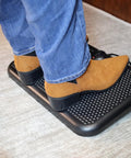 Person using Toasty Toes Foot Warmer And Ergonomic Heated Footrest With Three Adjustable Positions And Two Heat Settings Portable 105 Watt Space Heater In Black