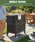 Outdoor Grill Cart With Stainless Steel Top, Rolling Utility Station, on patio with woman, showing side shelf feature
