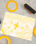 Four Pack Painters Tape Set With 1/16, 1/8, 1/4 And 1/2 Inch Widths, 52 Yards Each on concrete with yellow tape art.