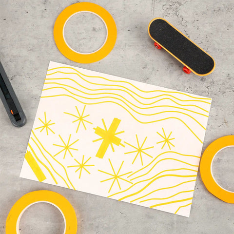 Four Pack Painters Tape Set With 1/16, 1/8, 1/4 And 1/2 Inch Widths, 52 Yards Each on concrete with yellow tape art.