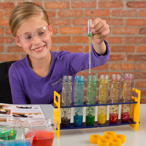 Child using Large Plastic Test Tubes and Rack Set With Six Bottles Kid Friendly Science Experiments Durable Clear Lab Kit