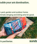 Hand holding Fast Fire Ant And Harvester Ant Killer Granules, Bio Based Ant Bait, outdoor yard and garden use, 2 pack 2 x 1 lb.