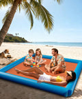 Family using 2-In-1 Sand Free Beach Blanket And Tent, 79 By 83 Inch Waterproof Picnic Blanket With Built-In Inflatable Pillows on beach
