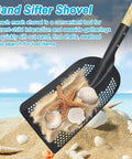 Beast Sand Sifter Shovel with dense hole square head, wooden handle, shown with shells on beach for sand screening.