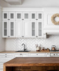 Modern kitchen with Slick Oil Rubbed Bronze Kitchen Cabinet Knobs 10 Pack, Solid Zinc Pulls For Cupboards And Drawers on white cabinets.