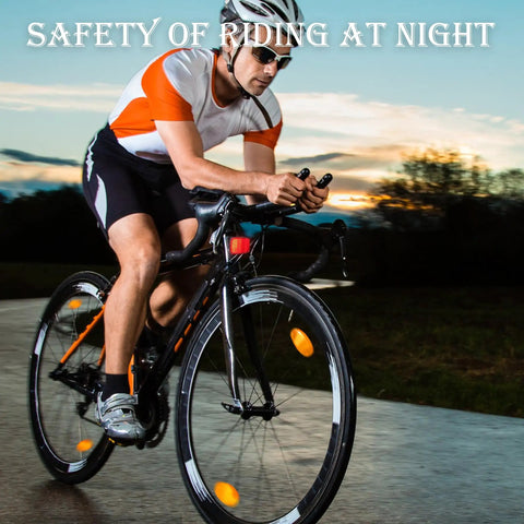 Cyclist at dusk with Six Pack Bike Reflectors Front and Rear with Wheel Spoke Brackets for Handlebar and Seat Post High Visibility