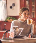 Moen Instant Hot SIP Faucet with Insulated Spout, Spot Resist Stainless, 2-Step Activation and Hands-Free Filling, Requires Tank (Sold Separately), IH7620SRS used in a cozy kitchen setting.