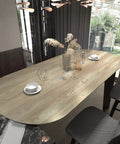 Oval dining table with faux wood grain contact paper, showcasing a vintage oak finish in dining room.