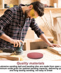 Man using bench sander with Woodworking Sanding Belts and Discs Set for Bench Sander DIY Friendly, alumina disc on table