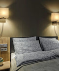 Set Of 2 Black Plug In Wall Sconces With USB Charging Ports And AC Outlet Wall Mounted Bedside Lamps in bedroom over bed