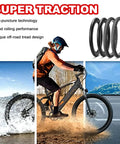 26 Inch Mountain Bike Tire Set 26x1.95 With Schrader Valve Inner Tubes, cyclist riding on rugged trail with mountain bike tires visible