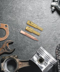 Spot Weld Dent Puller Kit With Metal Chuck For Car And Sheet Metal Repair on dark surface with metal tools
