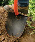 Heavy Duty All Steel Round Point Shovel With 48 Inch Tubular Alloy Handle One Piece Welded Construction Thick 12 Gauge Blade 8.75 By 11.75 Inches Built For Tough Yard Work And Digging Tasks being used to dig soil