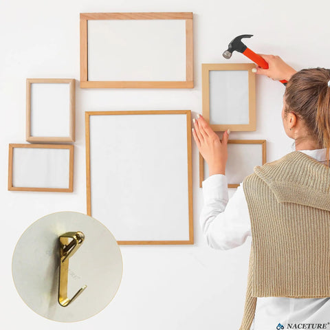 Woman using Ultimate Picture Hanging Kit With 521 Pieces Including Drywall Anchors Screws Nails And Cup Hooks for frames