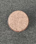 Heavy Duty Nail On Furniture Glides Brown 100 Pack Smooth Chair Pads for Hardwood Tile And Laminate Floors close-up image showing one glide.