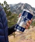 Make Every Sip Hit Different With This Dope 20 Oz Stainless Steel Tumbler Featuring Double Wall Insulation And Secure Lid For Dallas Cowboys Fans Who Want Their Coffee Tea Or Cocktails Staying Frosty All Day Long in hand outdoors.