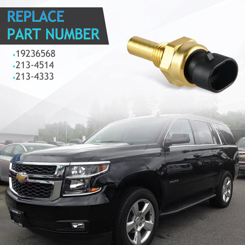 Engine coolant temperature sensor with brass body and black plastic connector; displayed above a black Chevy Tahoe.