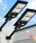 2 Pack Solar Street Light 180000 Lumens Outdoor LED Flood Light With Light Control And PIR Motion Sensor mounted on wall